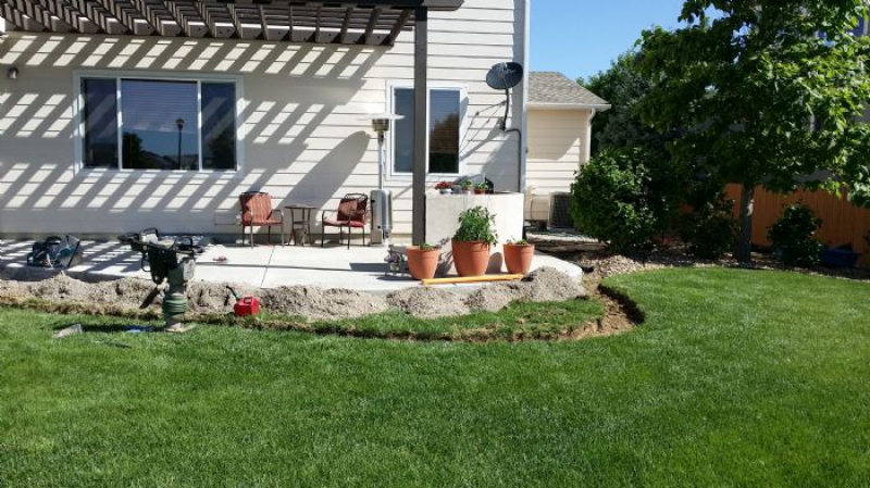 Slice It Landscaping Project photo 1 - Fire pit and retaining wall