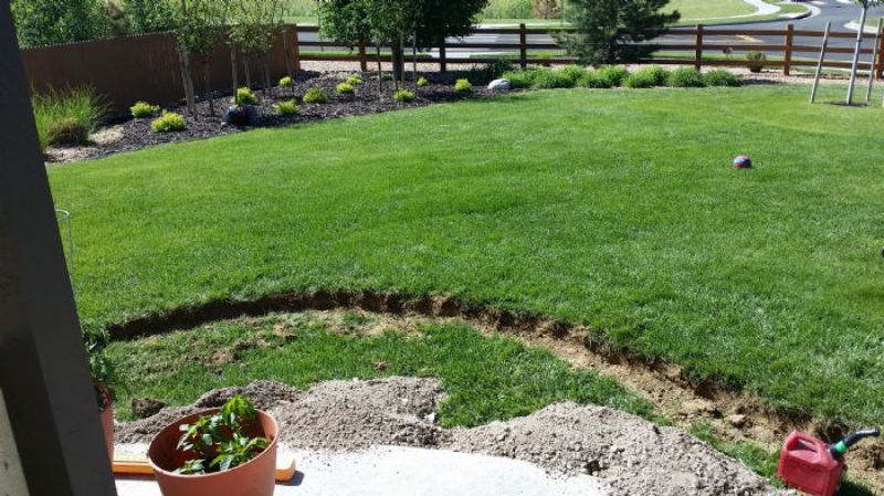 Slice It Landscaping Project photo 3 - Fire pit and retaining wall